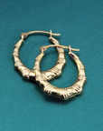 14K Yellow Gold Puffy Oval Hoop Earrings