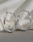 10K White Gold Twisted Diamond-Cut Hoop Earrings