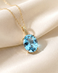 14k Yellow Gold Topaz Necklace, Brilliant Sky Blue 6 Carat Oval Shaped Topaz Gemstone Pendant