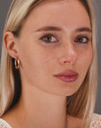 10K Yellow Gold Spiral Diamond-Cut Oval Hoop Earrings