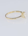 14K Yellow Gold Oval-Shaped Solitaire 1.5 Carat Engagement Ring With Side Stones