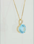 14k Yellow Gold Sky Blue Topaz Gemstone and Diamond Pendant