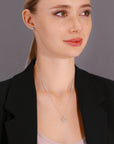 CZ Dangling Halo Heart Charm Necklace in Sterling Silver