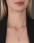 Love Knot Charm Necklace in Sterling Silver