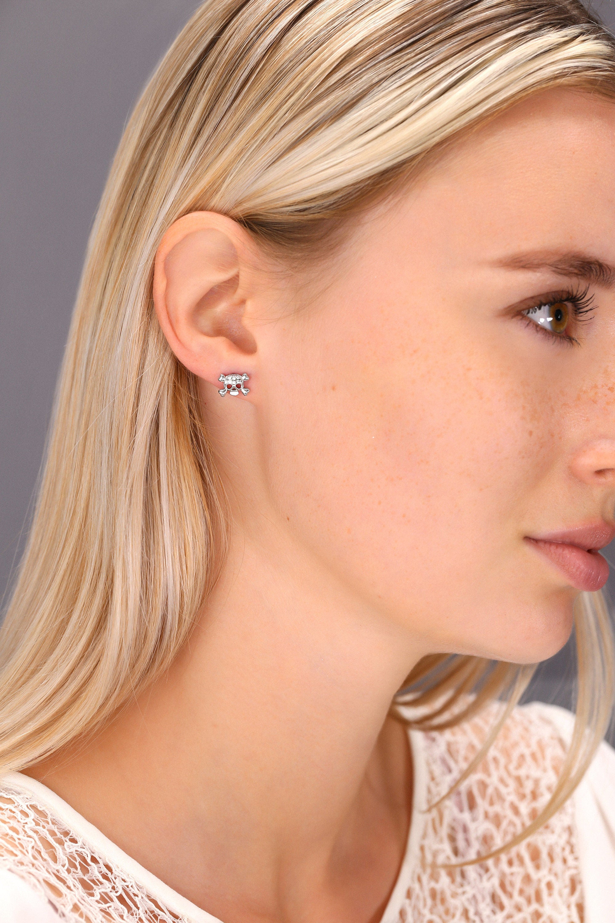 CZ Small Skull and Bones Stud Earrings in Sterling Silver