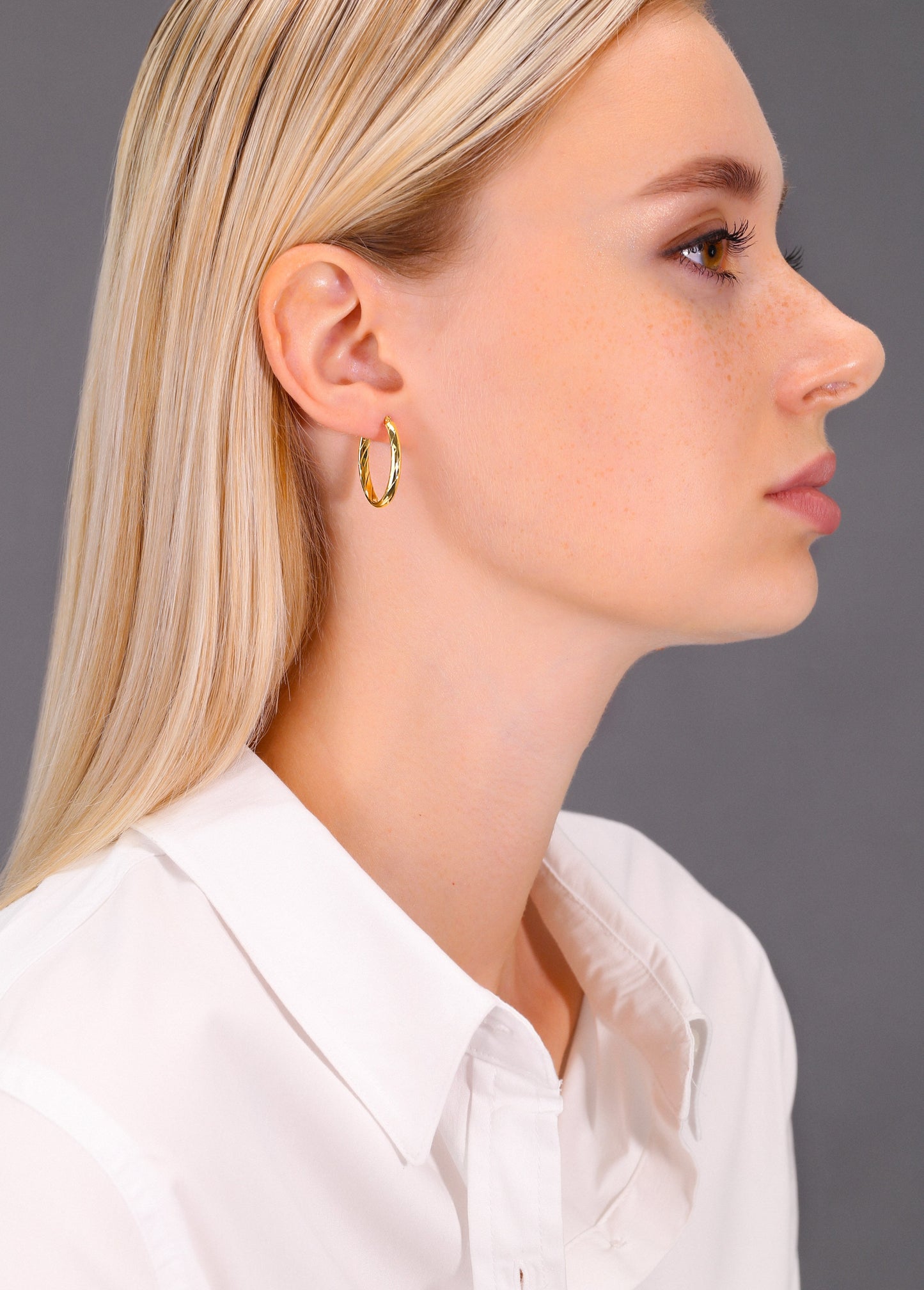 14k Yellow Gold Spiral Oval Hoop Earrings