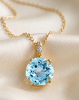 14k Yellow Gold Sky Blue Topaz Gemstone and Diamond Pendant