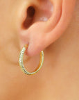14k Yellow Gold "X Pattern" Diamond-Cut Oval Hoop Earrings
