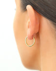 14k Yellow Gold "X Pattern" Diamond-Cut Oval Hoop Earrings