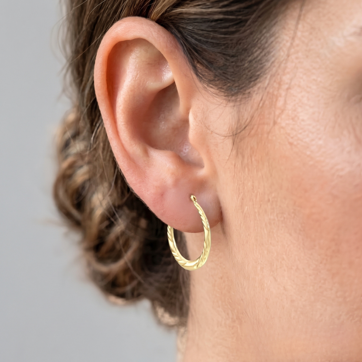 10K Yellow Gold Twisted Oval Hoop Earrings