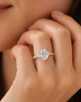 14K Yellow Gold Oval-Shaped Solitaire 1.5 Carat Engagement Ring With Side Stones