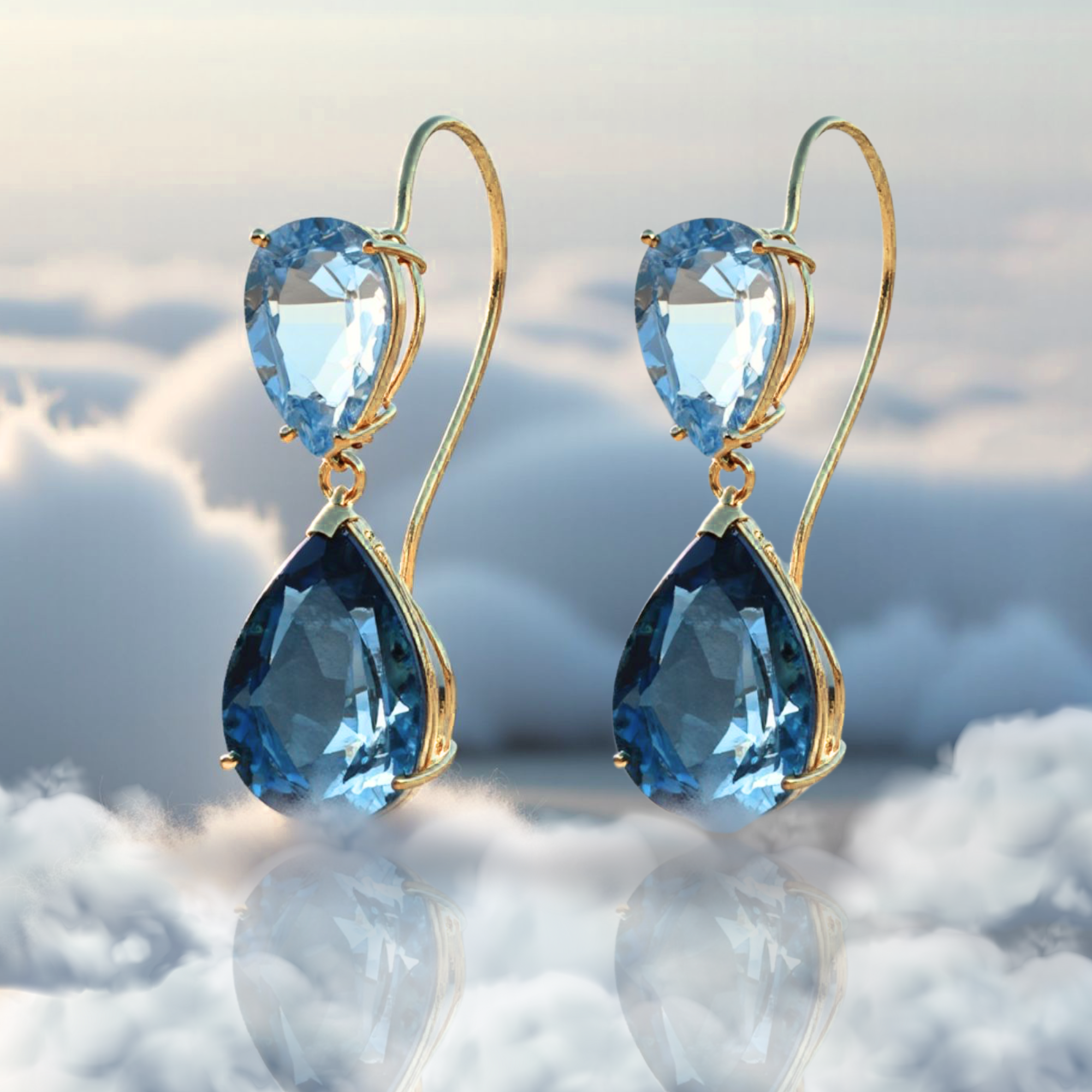 Sterling Silver Blue Topaz Pear Om Symbol Dangle Earring Sterling Silver Blue Topaz Pear Om Symbol Dangle Earring