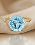 14K Yellow Gold Brilliant-Cut Round Sky Blue Topaz Gemstone Ring