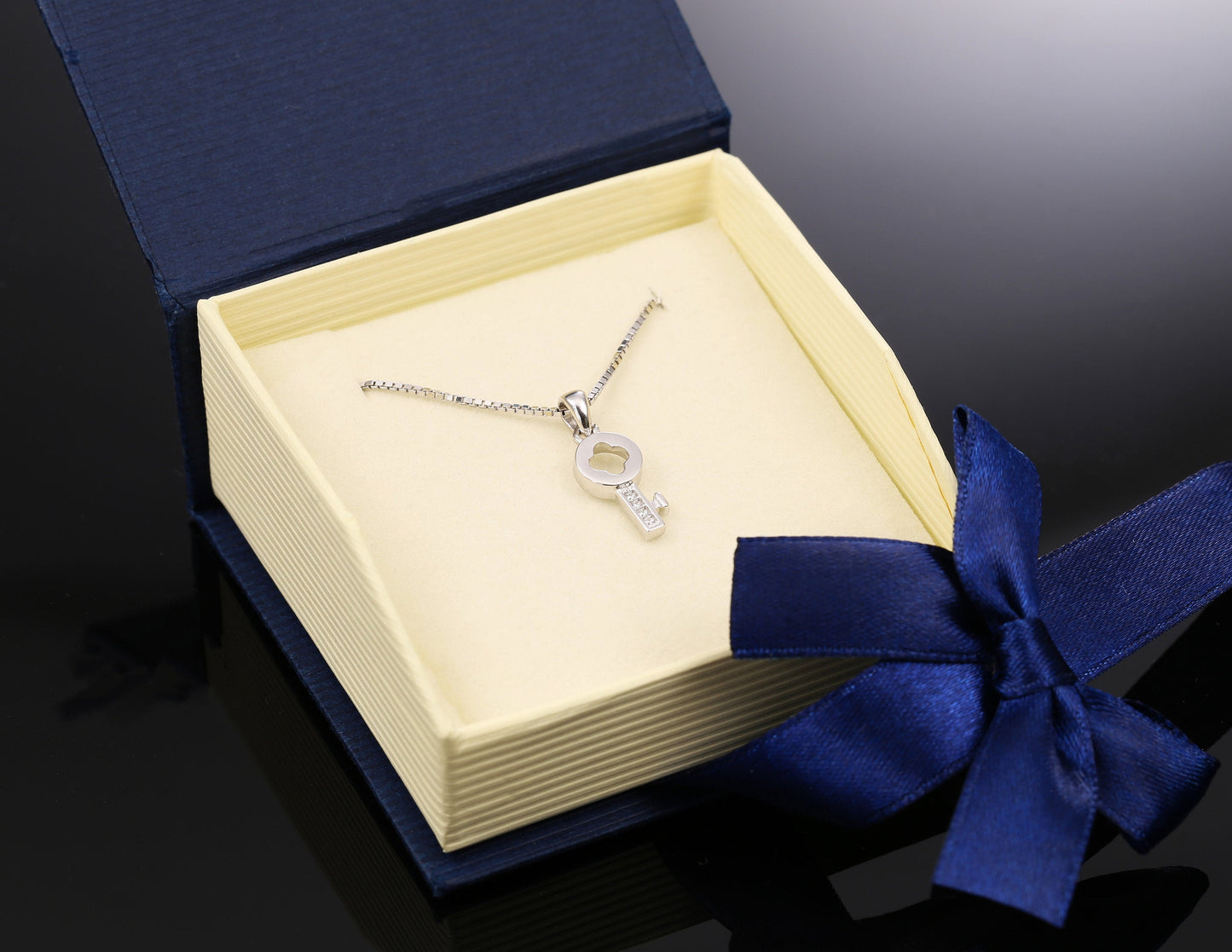 Sterling Silver Tiny Key Charm Necklace