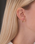 14K Gold Oval Diamond Cut Huggie Hoop Earrings