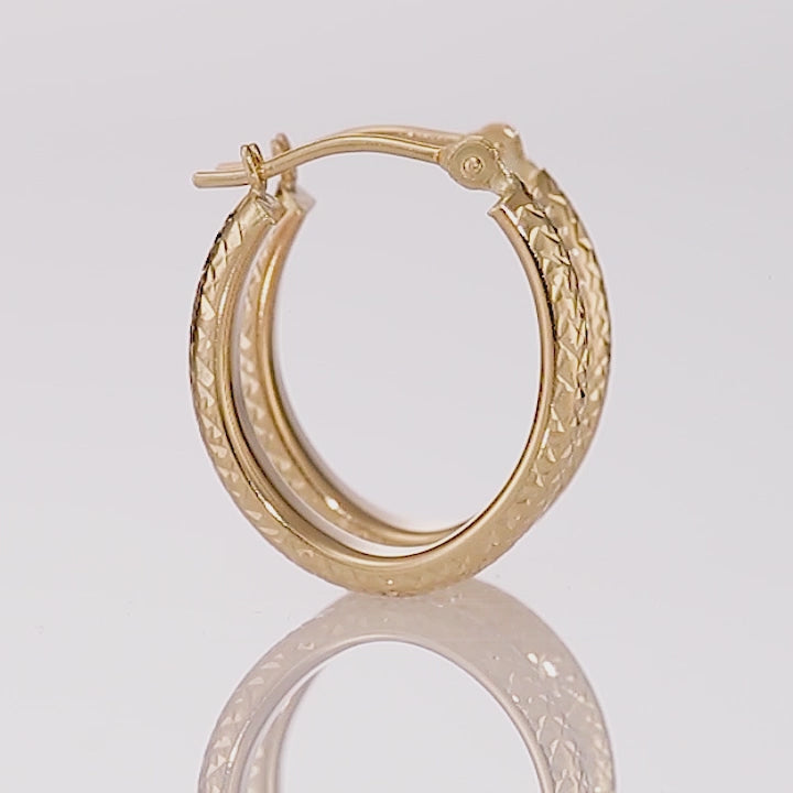 14k Yellow Gold X Pattern Diamond Cut Oval Hoop Earrings