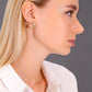 14k Yellow Gold Twisted Round Hoop Earrings with Hand Engraved Design